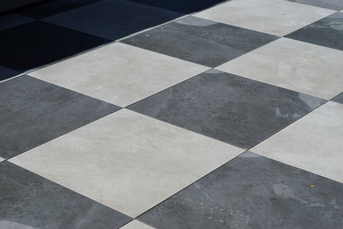 Uno Tiles at Executive Hotel Vintage Park by Deerwood Landscaping