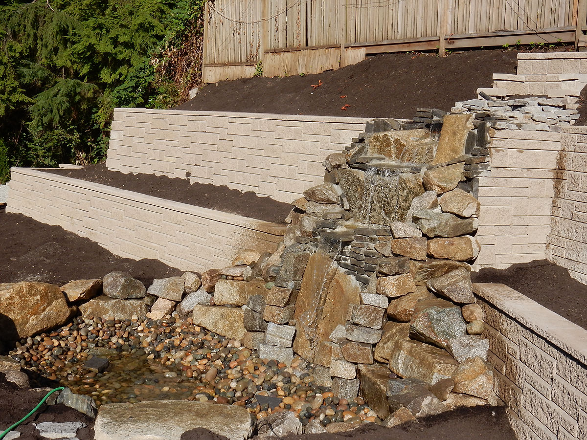 Custom waterfall in West Vancouver by Deerwood Landscaping